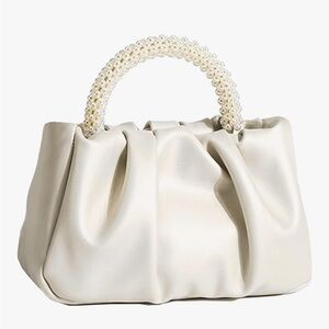 Elegant Cream Handbag with Pearl Handle